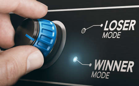 Man turning a switch to change his mindset from loser to winner mode.の写真素材