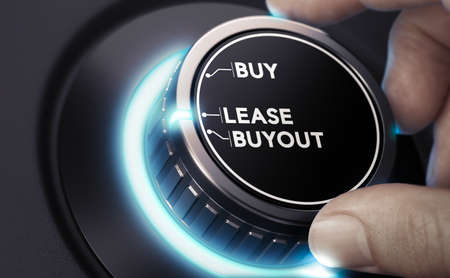 Finger turning a car knob to lease or buyout a vehicle. Composite image between a hand photography...
