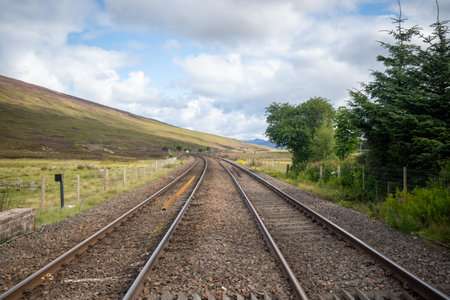 Two rail tracks in the countrysideの写真素材