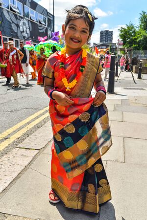 London, UK - 6/30/19 - People taking part in the Boishakhi Mela festival in Bethnal Green in London - The largest Bengali festival outside of Asiaのeditorial素材