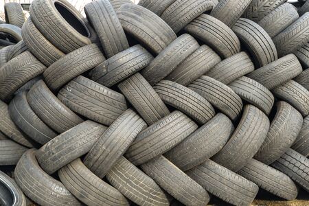 Lots of old tires stacked together