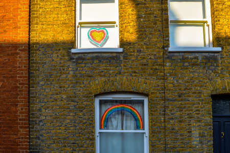 London/UK - 29/4/20 - Pictures of rainbows and put up in windows during the covid-19 crisisのeditorial素材