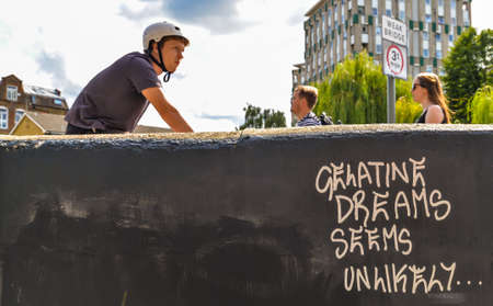 People cycling along a canal in London