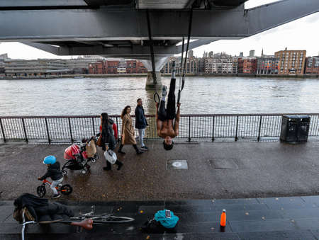 1/28/21 - A man doing acrobatics on the South Bank