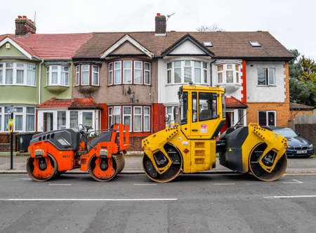 London/UK - 2/15/21 - Construction vehicles on the streetのeditorial素材
