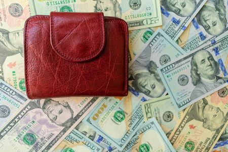 Women's wallet on dolar notes.の写真素材