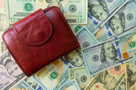 Women's wallet on dolar notes.の写真素材