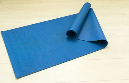 Blue yoga mat view from the top. The concept of yoga.の写真素材