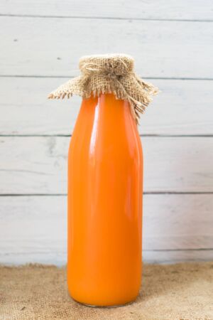 Bottle of carrot pumpkin juice. Close-up.の写真素材