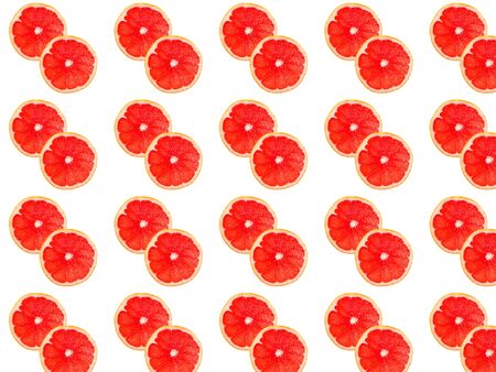 Seamless photo pattern of grapefruit slices on a white background. Seamless pattern for your design.