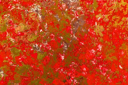 Bright red abstract paint texture on canvas. Abstract background. Imitation rust.