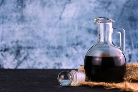 Soy sauce in a gravy boat. Copy space.の写真素材