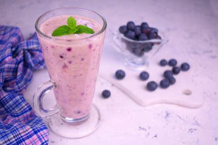 Blueberry Banana Smoothie Healthy Delicious Organic Drink Tall Glass White Backgroundの写真素材