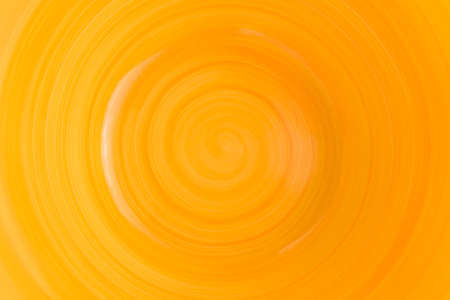 Background, ceramic plate in yellow colors. Copy space.