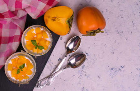 Yogurt Smoothie Persimmon White Background Flat Lay Copy Spaceの写真素材