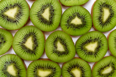 Kiwi slices background. Top view.の写真素材