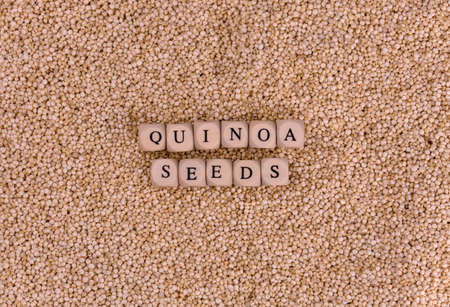 Quinoa seeds lettering on quinoa seeds background.の写真素材