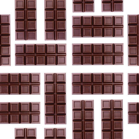 Bars of dark chocolate on a white background.Seamless pattern.の写真素材