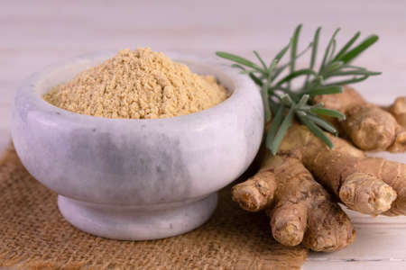 Ginger root and ginger powder. close-up.