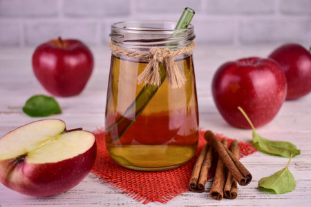 apple juice. Juice from red apples in a jar.の写真素材
