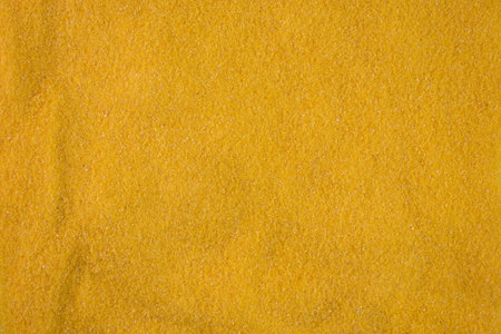 Abstract texture from corn grits. Corn products, gluten-free food.の写真素材