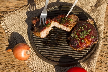 Steak on the grill. Fried meat. Fille on the frying panの写真素材
