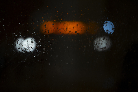 Raindrops on the night window.の写真素材