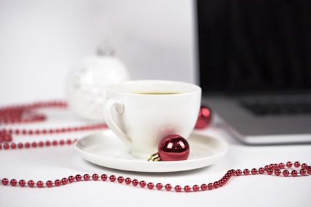 Laptop and coffee at work place.の写真素材