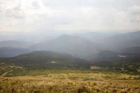 Beautiful landscape of mountains and forests against the blue sky. Travel concept.の写真素材