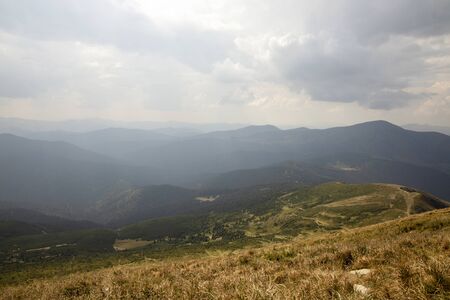 Beautiful landscape of mountains and forests against the blue sky. Travel concept.の写真素材