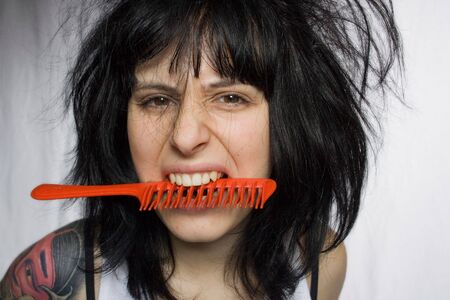 portrait of a woman with uncontrollable hairの写真素材