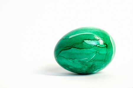 photo of the easter colorful egg on whiteの写真素材
