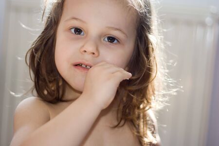 happy little girl with lollipopの写真素材