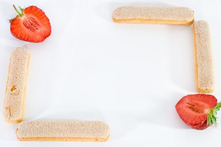 fresh strawberries with biscuits isolatedの写真素材