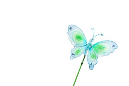 beautiful, blue butterfly - toy isolated on whiteの写真素材