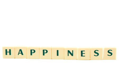 Happiness word. letters isolated on white. scrabble.の写真素材