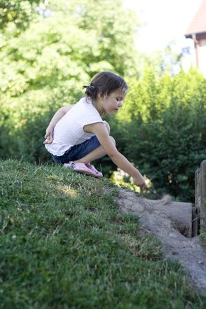 4 years old girl playing in the parkの写真素材