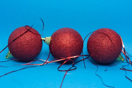 christmas decoration - ball against the blue backgroundの写真素材
