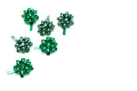 frame made of green bows isolated on whiteの写真素材