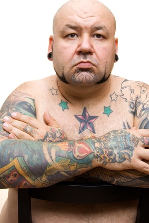 portrait of a bald man with tattoosの写真素材