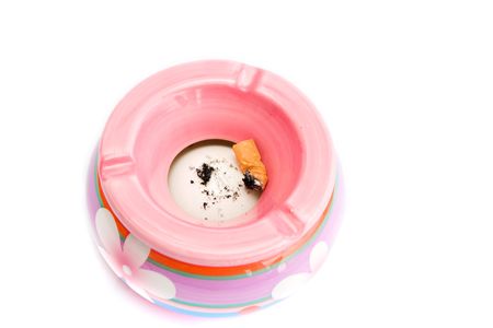 colorful ashtray with flower isolated on whiteの写真素材