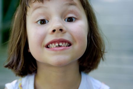 portrait of 5 years old gap toothed girl の写真素材