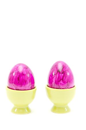 eggs in eggcups isolated on white. easterの写真素材