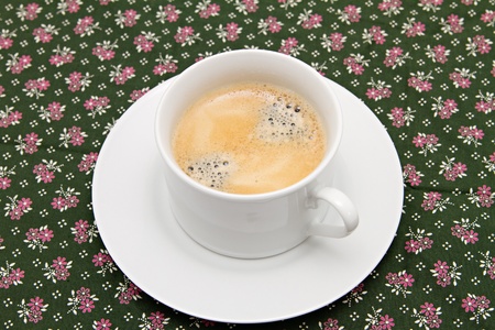 the cup of coffee on the tableの写真素材