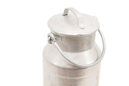 a vintage milk can isolated on whiteの写真素材