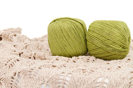 the green yarn skeins isolated on whiteの写真素材