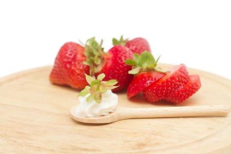 strawberries on a board isolated on whiteの写真素材