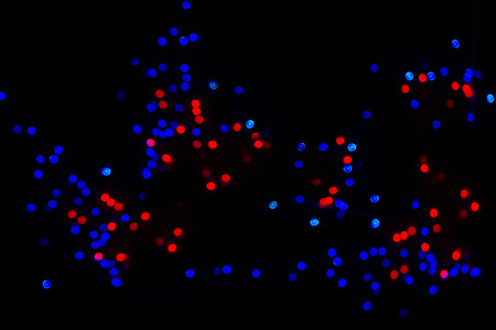 the blurred lights against the dark background