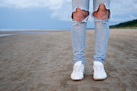 Jeans with holesの写真素材