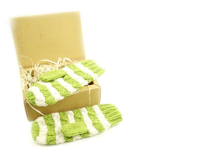 Christmas gift winter green with white mittensの写真素材